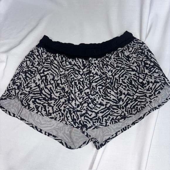 lululemon athletica Pants - Lululemon Tracker Short V Black White Animal  Print Running Shorts Size 10